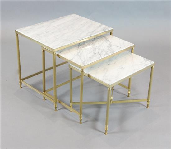 Attributed to Maison Bagues. A nest of three gilt brass occasional tables, largest W.1ft 8in. W.1ft 3in. H.1ft 5in.